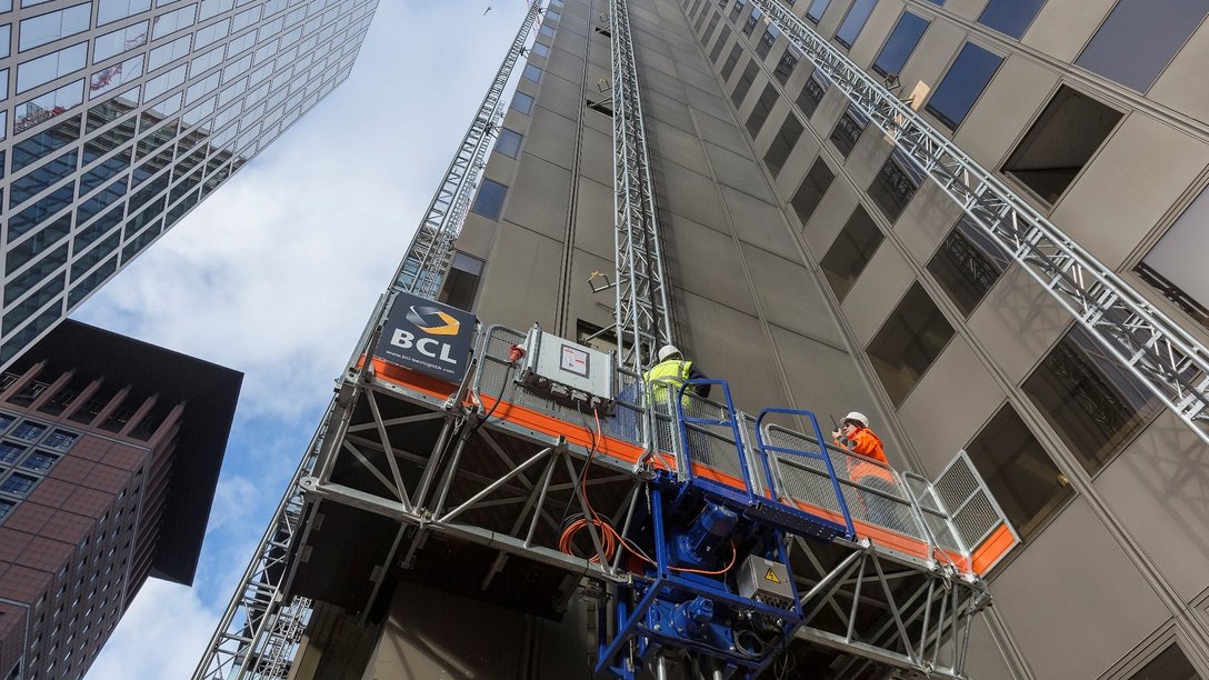 Construction elevator with BCL employees at Global Tower in Frankfurt/Main, Germany